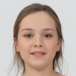 Joyful white child female with medium  brown hair and grey eyes