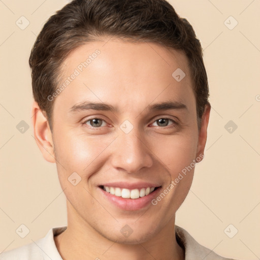 Joyful white young-adult male with short  brown hair and brown eyes