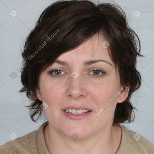 Joyful white adult female with medium  brown hair and brown eyes