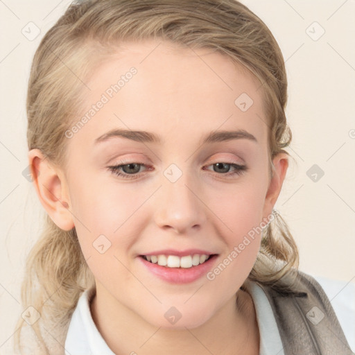 Joyful white young-adult female with medium  brown hair and blue eyes