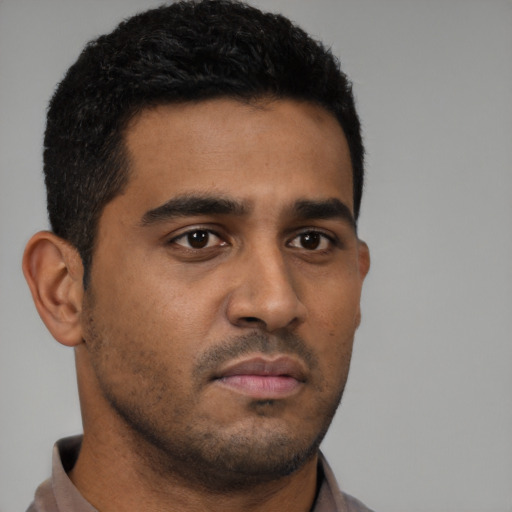 Neutral latino young-adult male with short  black hair and brown eyes