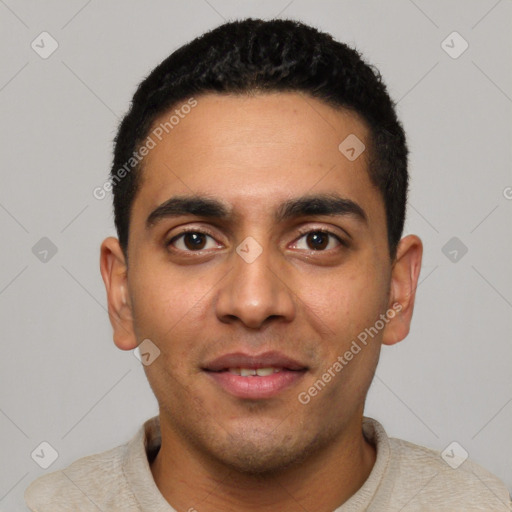Joyful latino young-adult male with short  black hair and brown eyes
