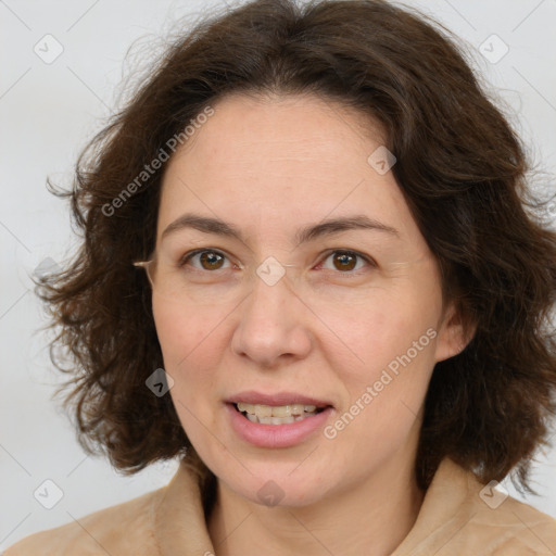 Joyful white adult female with medium  brown hair and green eyes