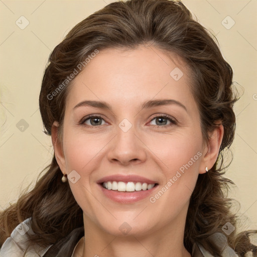 Joyful white young-adult female with medium  brown hair and green eyes