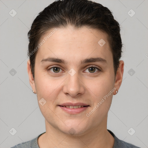 Joyful white young-adult female with short  brown hair and brown eyes