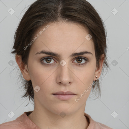 Neutral white young-adult female with medium  brown hair and brown eyes