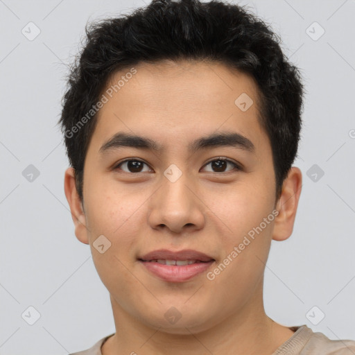 Joyful latino young-adult male with short  brown hair and brown eyes