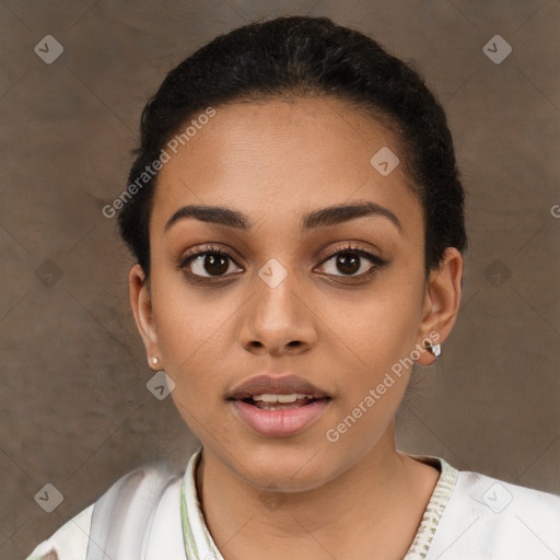 Joyful latino young-adult female with short  black hair and brown eyes