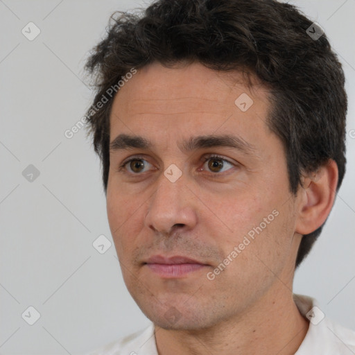 Neutral white adult male with short  brown hair and brown eyes