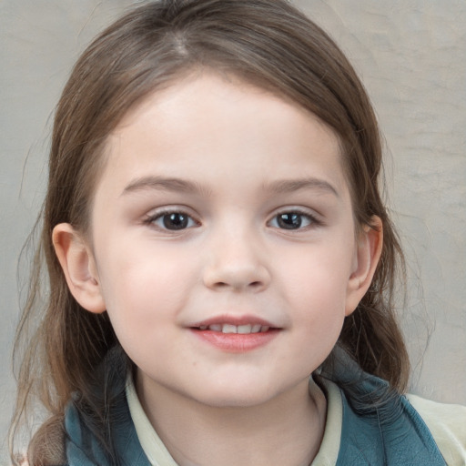 Joyful white child female with medium  brown hair and grey eyes