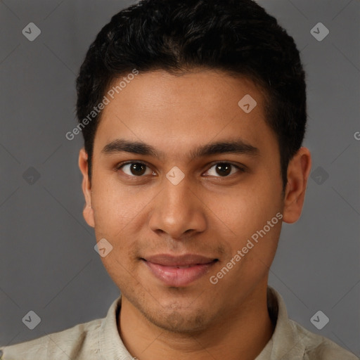 Joyful latino young-adult male with short  brown hair and brown eyes