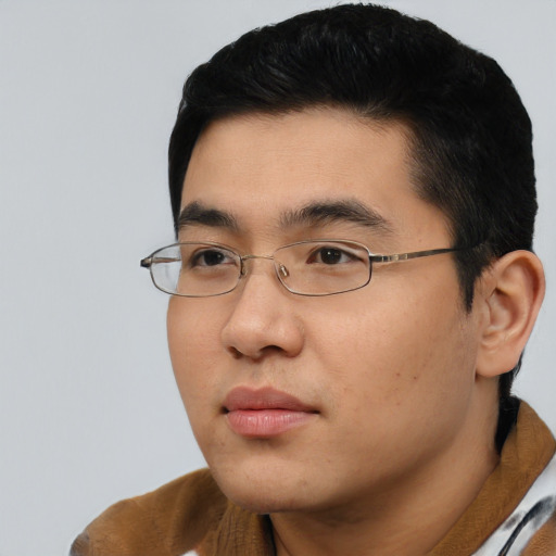 Neutral asian young-adult male with short  black hair and brown eyes