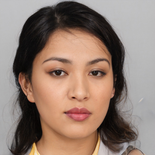 Neutral asian young-adult female with medium  brown hair and brown eyes
