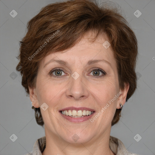 Joyful white adult female with medium  brown hair and grey eyes