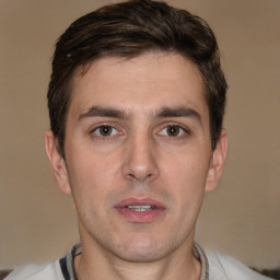 Neutral white adult male with short  brown hair and brown eyes