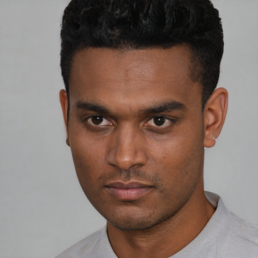 Neutral black young-adult male with short  black hair and brown eyes