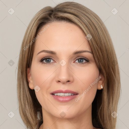 Joyful white young-adult female with medium  brown hair and green eyes