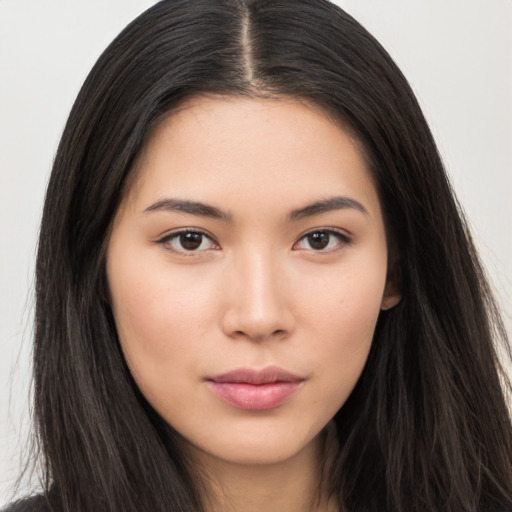 Neutral asian young-adult female with long  brown hair and brown eyes