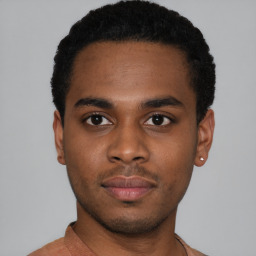 Neutral black young-adult male with short  black hair and brown eyes