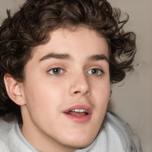 Joyful white child male with medium  brown hair and brown eyes