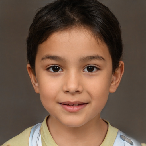 Joyful white child female with short  brown hair and brown eyes