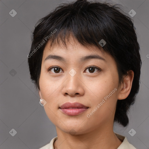 Joyful asian young-adult female with medium  brown hair and brown eyes