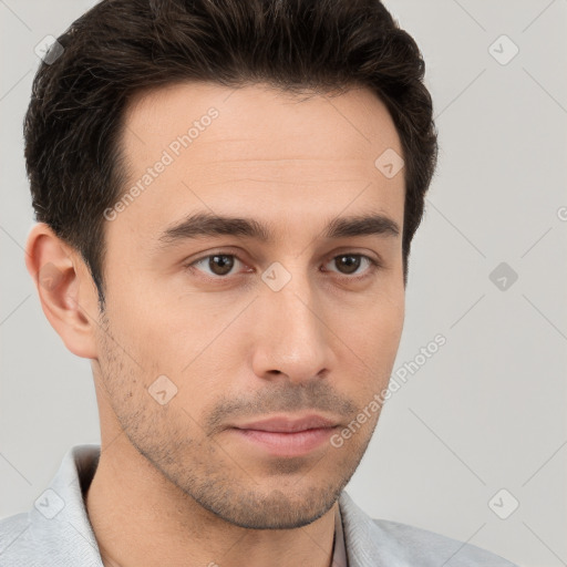 Neutral white young-adult male with short  brown hair and brown eyes