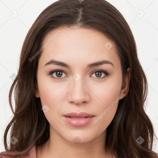 Neutral white young-adult female with long  brown hair and brown eyes