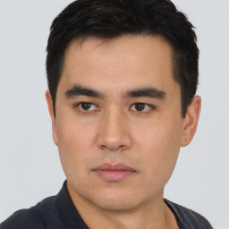 Neutral asian young-adult male with short  black hair and brown eyes