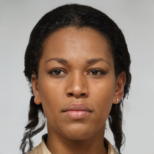 Neutral black young-adult female with medium  black hair and brown eyes