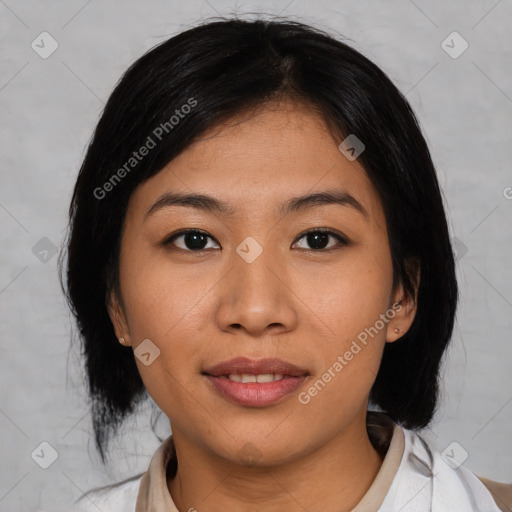 Joyful asian young-adult female with medium  black hair and brown eyes