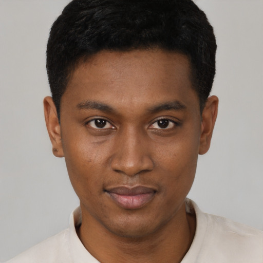 Neutral black young-adult male with short  black hair and brown eyes