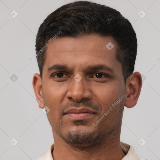 Neutral latino young-adult male with short  black hair and brown eyes