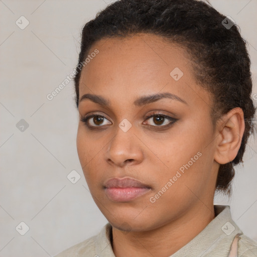 Neutral black young-adult female with short  brown hair and brown eyes