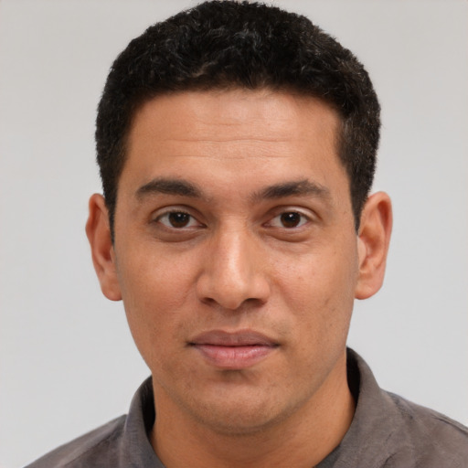 Neutral white adult male with short  black hair and brown eyes
