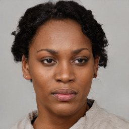 Neutral black young-adult female with short  brown hair and brown eyes