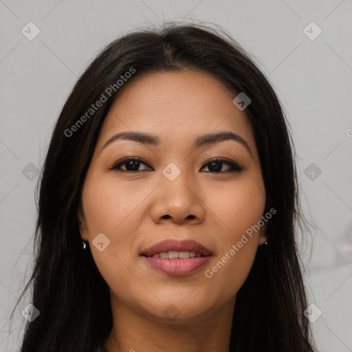 Joyful asian young-adult female with long  brown hair and brown eyes