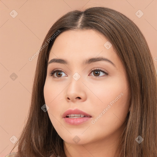 Neutral white young-adult female with long  brown hair and brown eyes