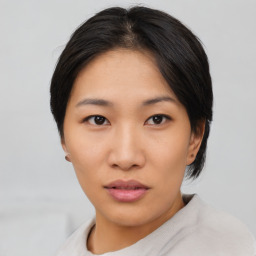 Neutral asian young-adult female with short  black hair and brown eyes