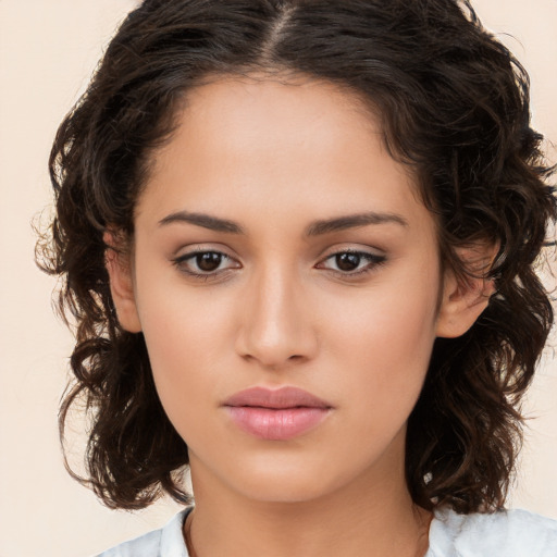 Neutral white young-adult female with medium  brown hair and brown eyes