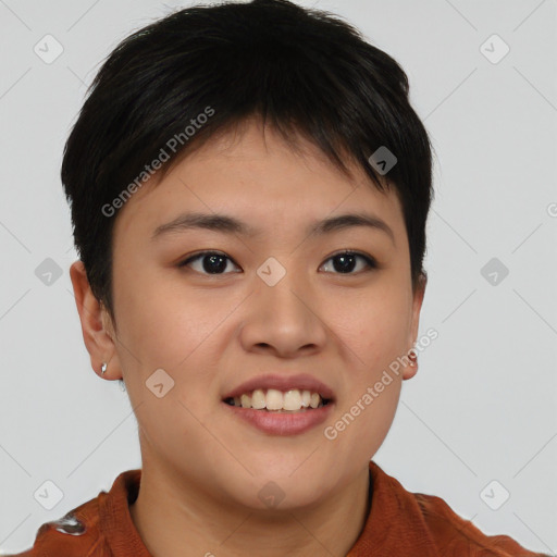 Joyful asian young-adult female with short  brown hair and brown eyes