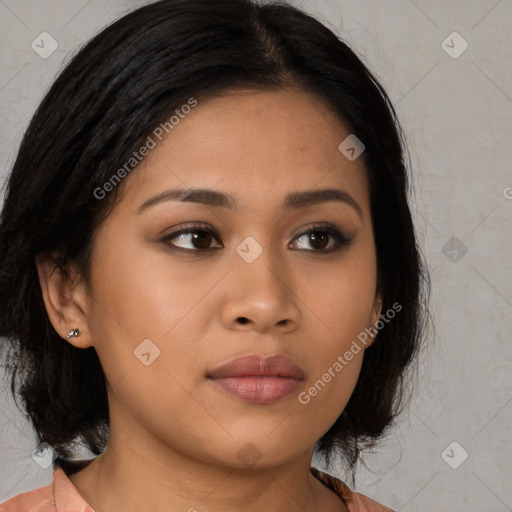 Joyful asian young-adult female with long  brown hair and brown eyes