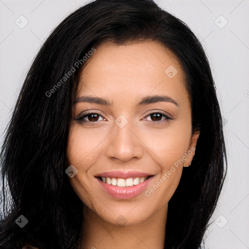 Joyful white young-adult female with long  brown hair and brown eyes