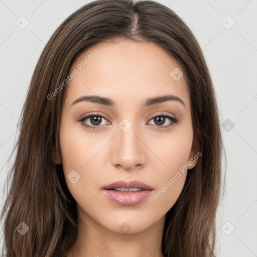 Neutral white young-adult female with long  brown hair and brown eyes