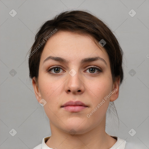 Neutral white young-adult female with short  brown hair and brown eyes