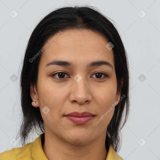 Joyful latino young-adult female with medium  brown hair and brown eyes