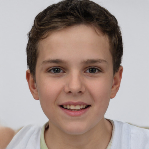 Joyful white child female with short  brown hair and brown eyes