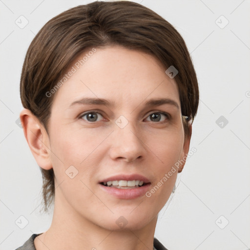 Joyful white young-adult female with short  brown hair and grey eyes