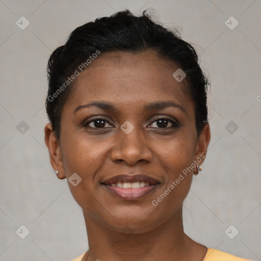 Joyful black young-adult female with short  brown hair and brown eyes