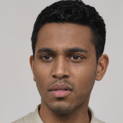 Neutral black young-adult male with short  black hair and brown eyes
